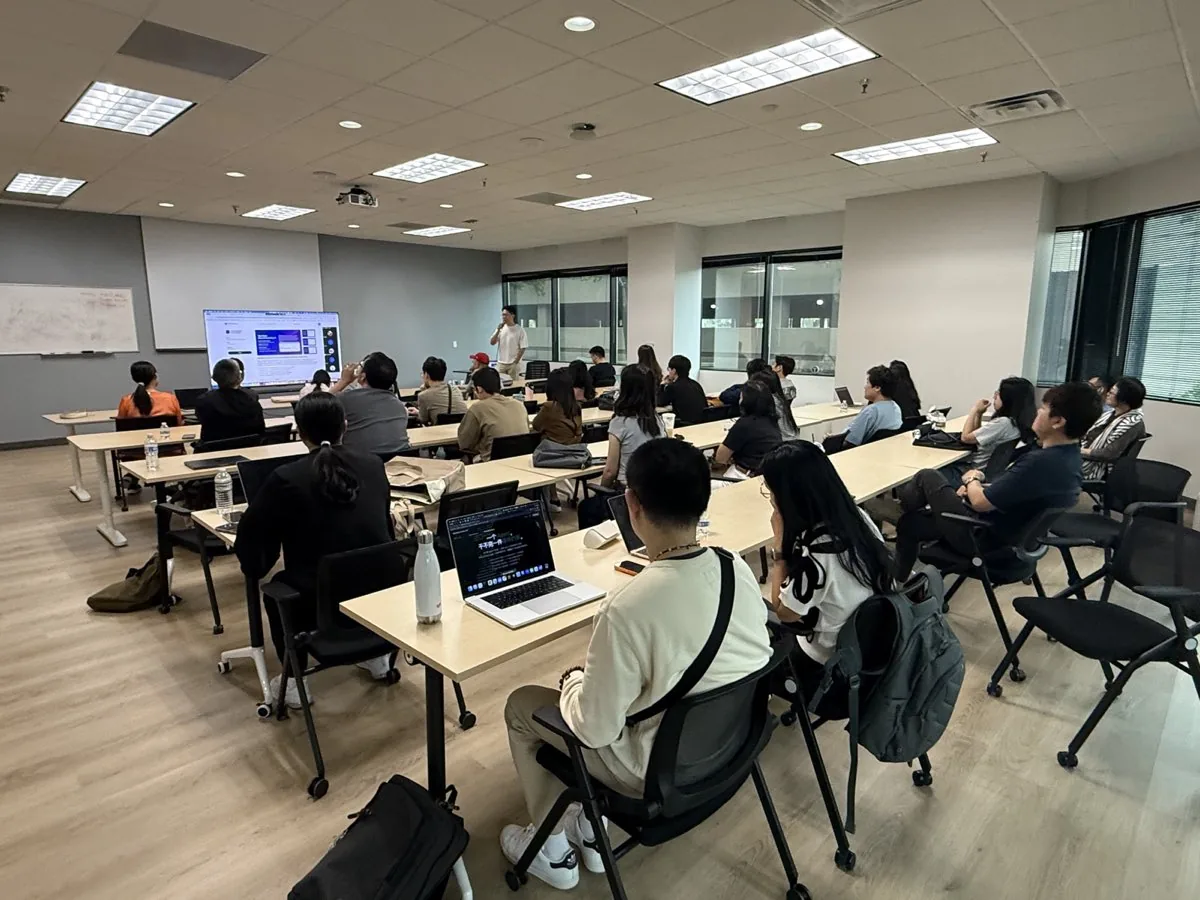 Jack Qian teaching a hands-on community AI workshop in Dallas